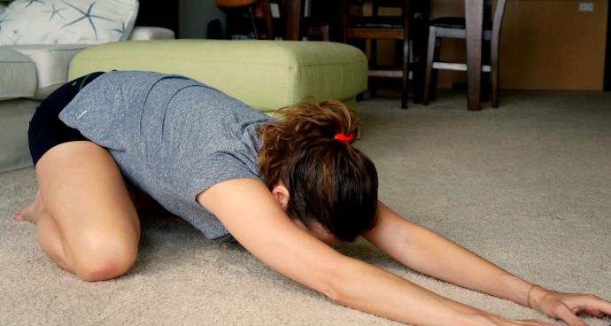 Child's pose to release a tight lower back - click for 5 more exercises to help